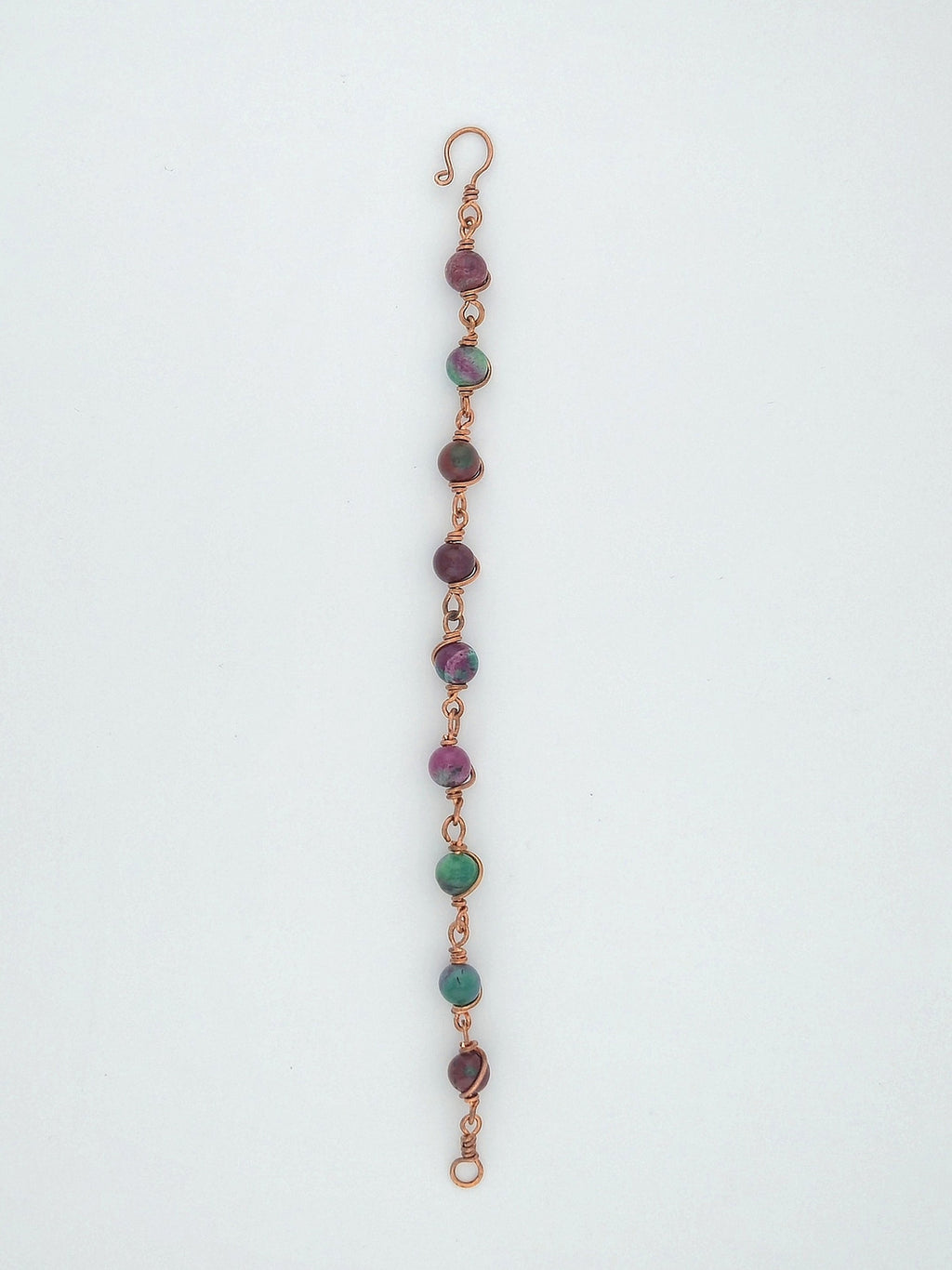 Handcrafted plum and green stone bead bracelet with copper wire links by Willow Tree Studio