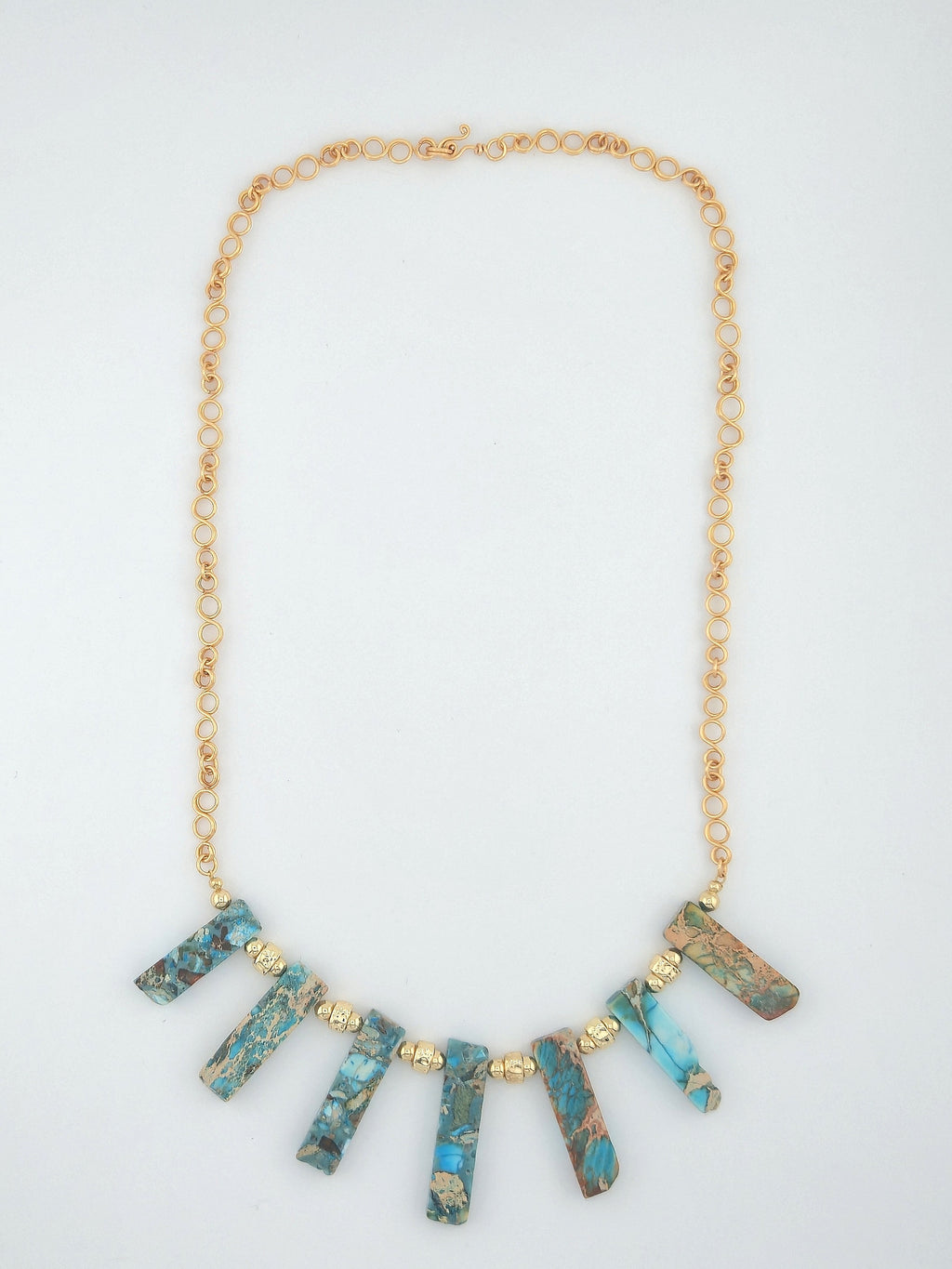 Artisan collar necklace with Imperial Jasper bars and handcrafted 4-loop gold chain links by Willow Tree Studio.